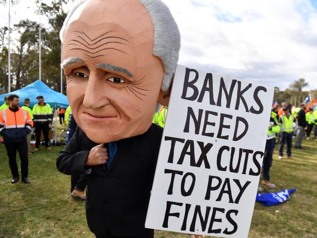 Workers and unionists protested for better wages and working conditions outside Parliament House yesterday. Picture: AAP Image/Mick Tsikas