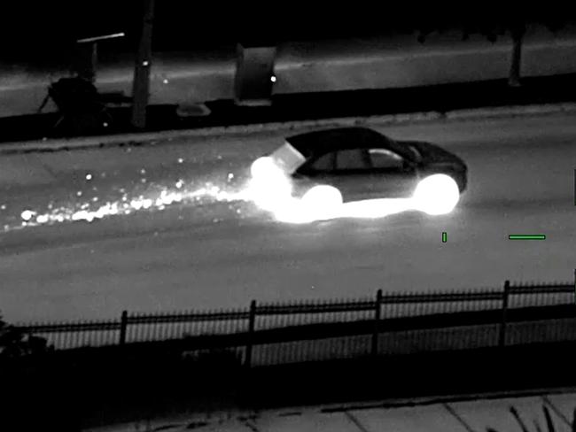 The dramatic night-vision shows sparks flying from the car.