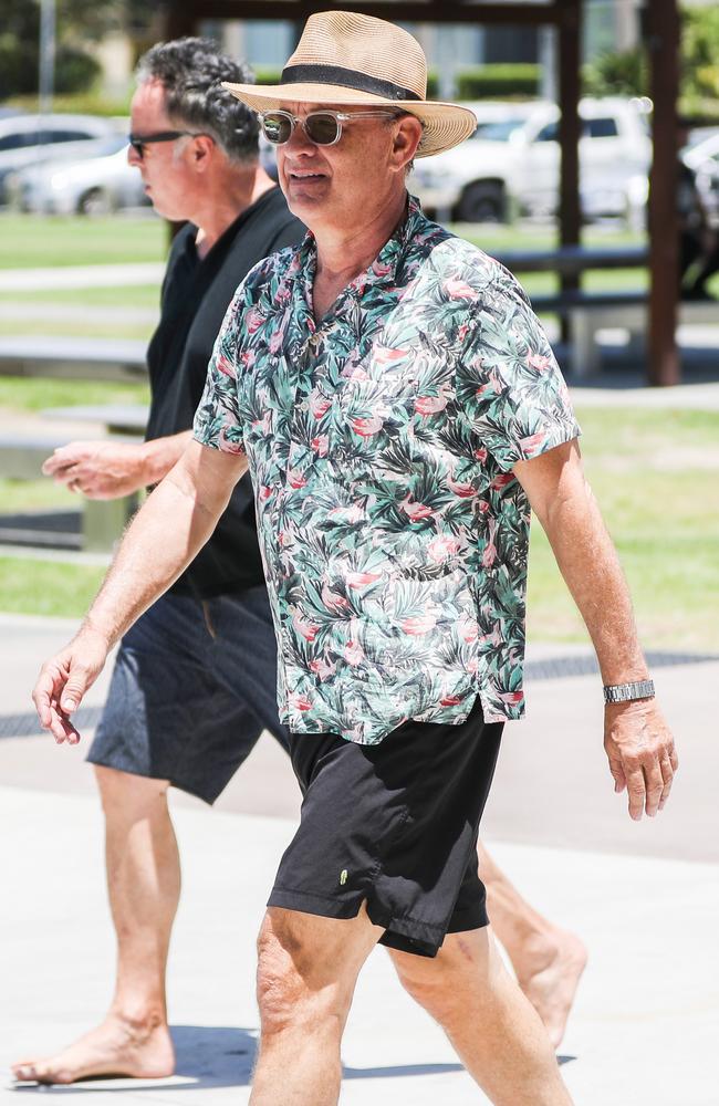 Tom Hanks enjoying a stroll along the beach in Broadbeach on the Gold Coast in January. Picture: Nigel Hallett