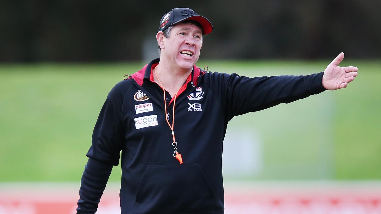 Brett Ratten speaks to players during a training session this week.