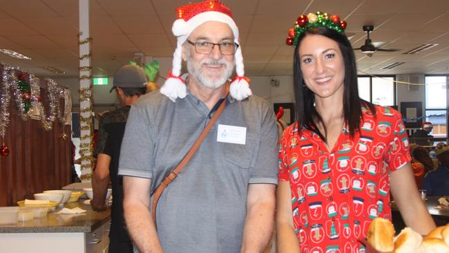 Sharing the festive spirit were volunteers Paul and Jo at the 2022 Cairns Community Christmas Lunch. Picture: Alison Paterson