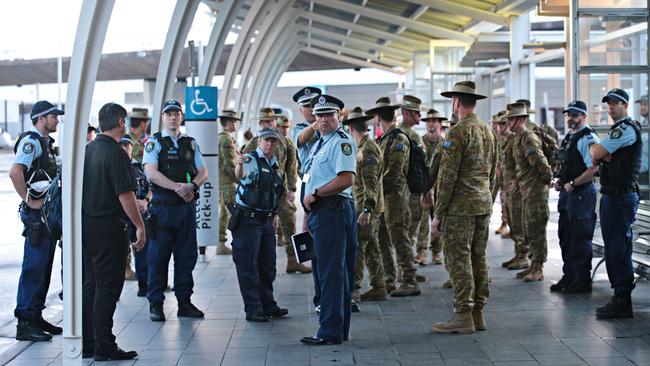 There was a heavy police and army presence for the first lot of international arrivals landing at Sydney Airport on Sunday.