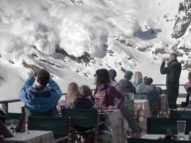 Mini-avalanche strikes ... Tomas and Ebba’s family are on the balcony of the restaurant in the French Alps.