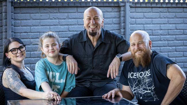 ADELAIDE, SOUTH AUSTRALIA - Advertiser Photos DECEMBER 9, 2024: Ami Boundy 41yrs (L) with her fiancÅ½e Simon Warne 42yrs (R), her ex-husband and best friend Danny Lopresto 57yrs (M) and and their daughter Ruby 8yrs. Picture Emma Brasier