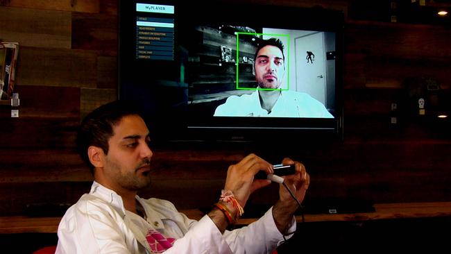 2K Games’ shows Ronnie Singh scanning his face into the game.