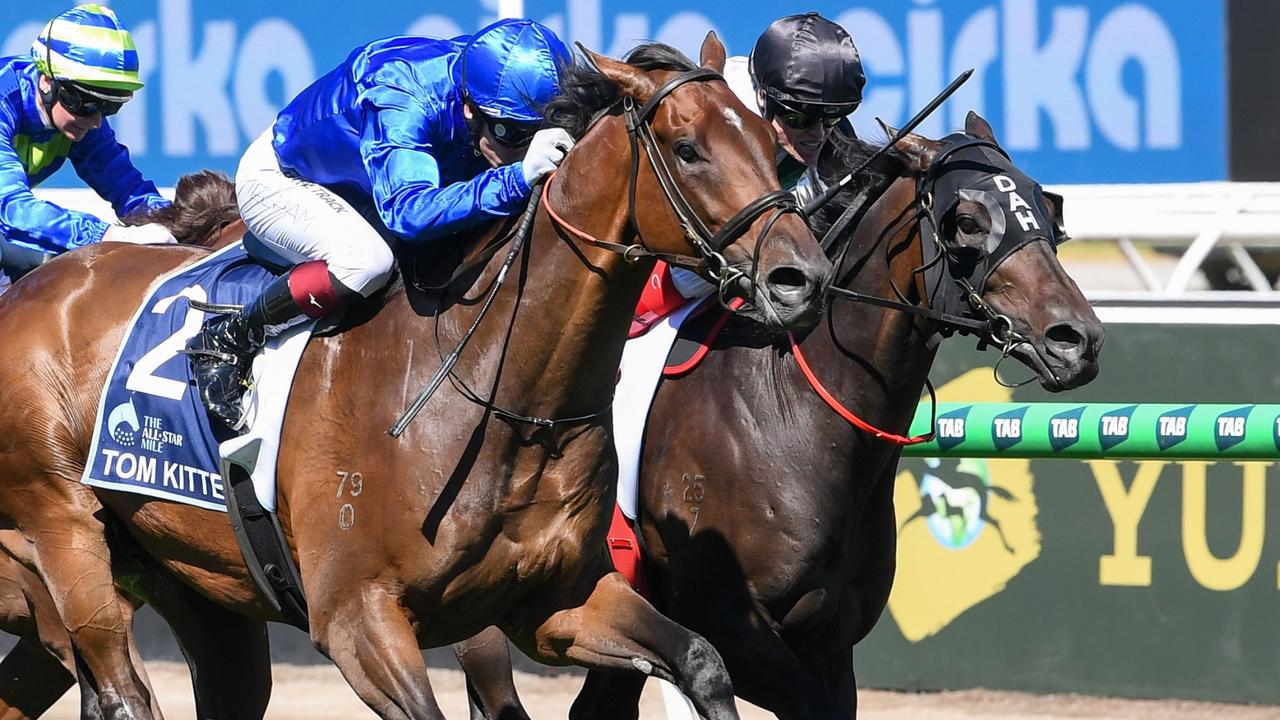 Tom Kitten (left) runs down Mr Brightside to win the Group 1 All-Star Mile at Flemington. Picture: Brett Holburt/Racing Photos via Getty Images