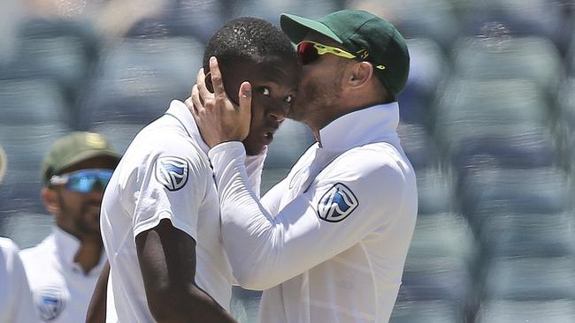 South Africa's Faf du Plessis kisses Kagiso Rabada. (AP Photo/Rob Griffith)