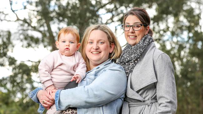 Danielle Snelling and Eloise Baker-Hughes, pictured with daughter Matilda, co-founded the not-for-profit Motherless Daughters. Picture: Tim Carrafa