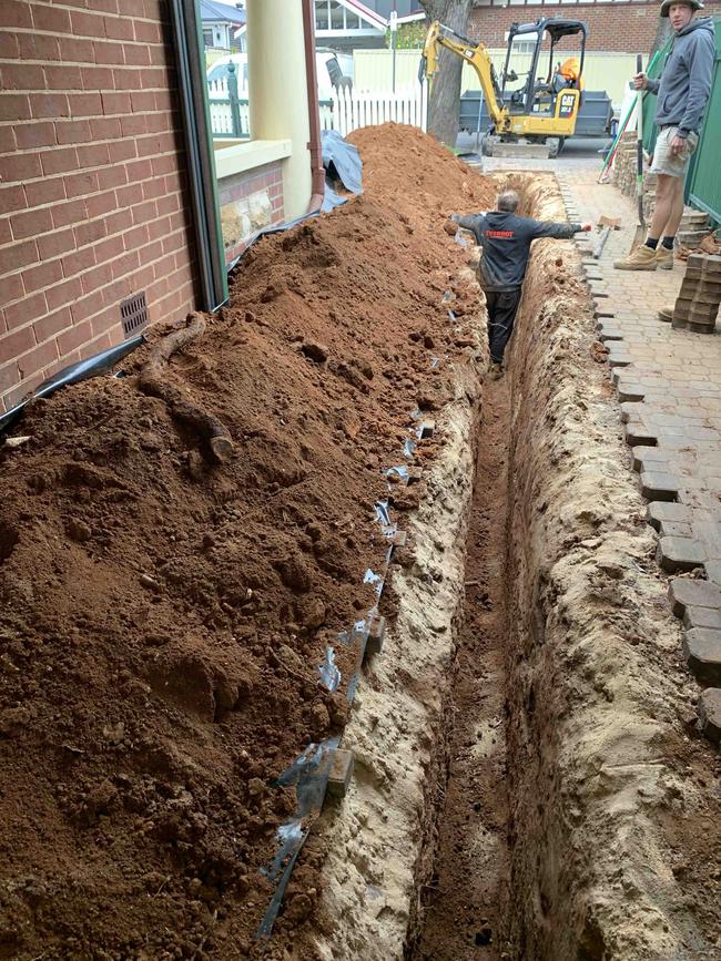 Mr and Ms Djukic's driveway in Prospect, after it was dug up to repair plumbing damage caused by tree roots spreading from a public verge. Picture: Supplied