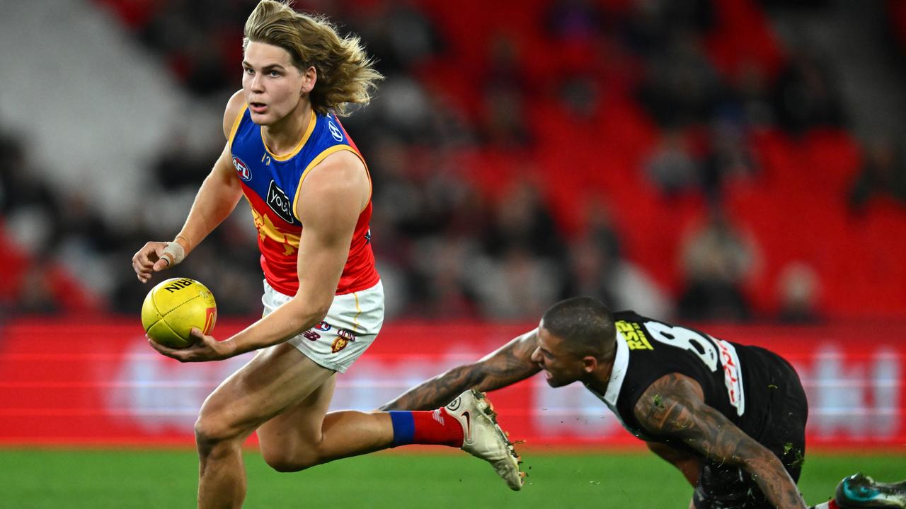 MELBOURNE, AUSTRALIA - JUNE 23: Will Ashcroft of the Lions handballs during the round 14 AFL match between St Kilda Saints and Brisbane Lions at Marvel Stadium, on June 23, 2023, in Melbourne, Australia. (Photo by Quinn Rooney/Getty Images)