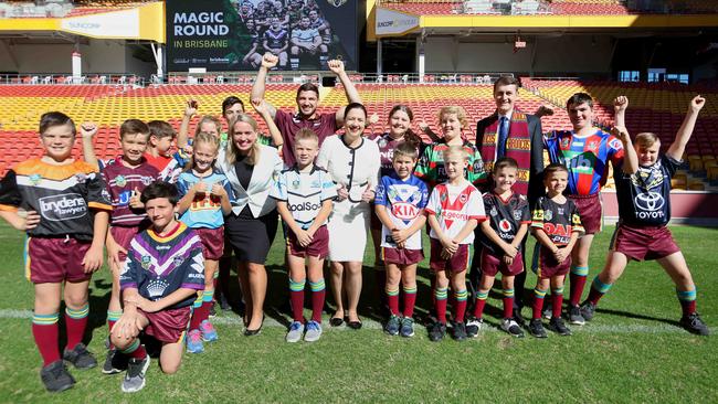 Brisbane’s Matt Gillett with Queensland Premier Annastacia Palaszczuk and the Aspley Devils Juniors at the announcement. (Bruce Long)