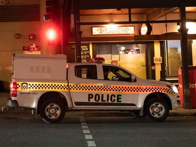 Police are seen along North Terrace at night, Adelaide/ Kaurna Land, on Thursday, June 15, 2023. (The Advertiser/ Morgan Sette)