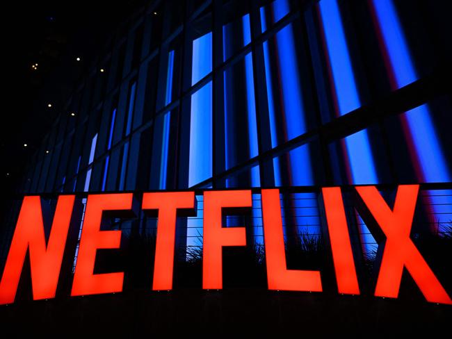 (FILES) The Netflix logo is seen at the Netflix Tudum Theater in Los Angeles, California, on September 14, 2022. Netflix on July 19, 2023 said subscriptions to the streaming television service climbed to more than 238 million in the wake of its crackdown on password sharing. Netflix finished the recently ended quarter with an addition 5.9 million subscribers and a profit of $1.5 billion, according to an earnings release. (Photo by Patrick T. FALLON / AFP)