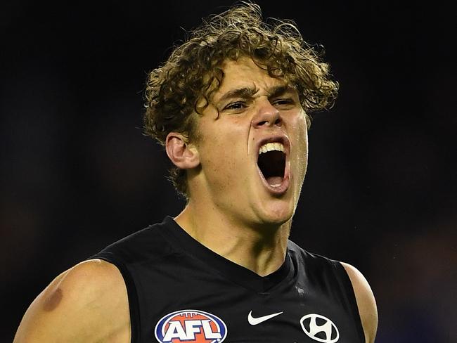 Charlie Curnow of the Blues reacts after kicking a goal during the Round 13 AFL match between the Carlton Blues and the Western Bulldogs at Marvel Stadium in Melbourne, Saturday, June 15, 2019.  (AAP Image/Julian Smith) NO ARCHIVING, EDITORIAL USE ONLY