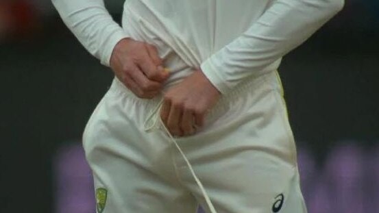 Where it all began … Cameron Bancroft tries to conceal the sandpaper