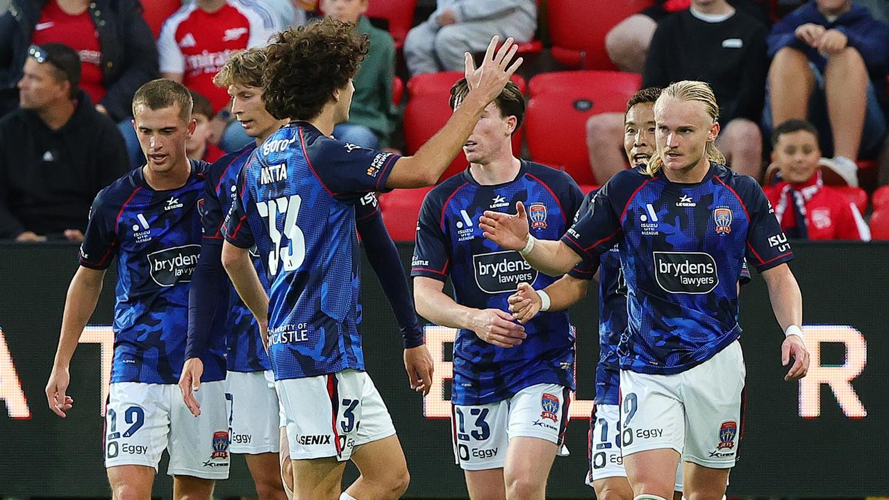 ADELAIDE, AUSTRALIA - FEBRUARY 15: Lachlan Rose of Newcastle Jets with teammates after his goal during the round 19 A-League Men match between Adelaide United and Newcastle Jets at Coopers Stadium, on February 15, 2025, in Adelaide, Australia. (Photo by Sarah Reed/Getty Images)