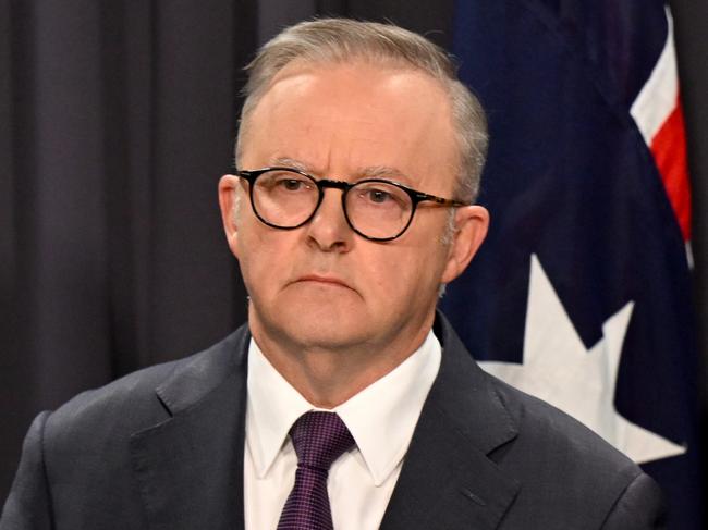 Australian Prime Minister Anthony Albanese (left) and ASIO Director-General Mike Burgess speak during a press conference at Parliament House in Canberra, Monday, August 5, 2024. (AAP Image/Lukas Coch) NO ARCHIVING