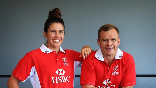 Two-time world rugby women's sevens player of the year Charlotte Caslick with Australian coach Tim Walsh. Picture: Toby Zerna