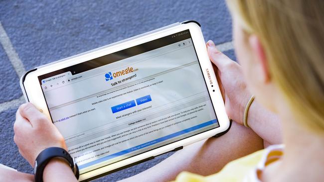 Stock photo of child using free online chat website 'Omegle'. Picture: AAP Image/Richard Walker
