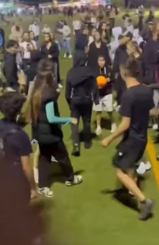 Dozens of youths gathered around as the ugly brawl erupted.