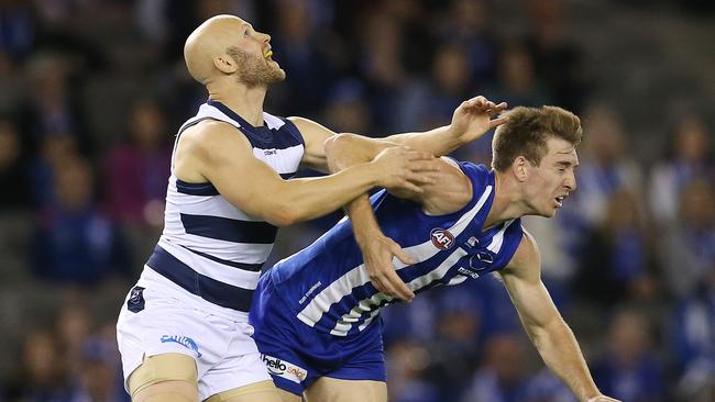 Gary Ablett has his eyes on the ball as he nudges Sam Durdin off balance. Picture: Michael Klein