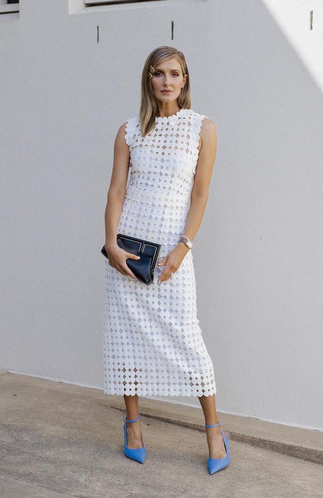 Racing royalty Kate Waterhouse chose a white midi dress with blue heels. Picture: Instagram/KateWaterhouse