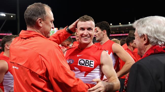 John Longmire, Senior Coach of the Swans and Chad Warner. Picture: Cameron Spencer/Getty Images