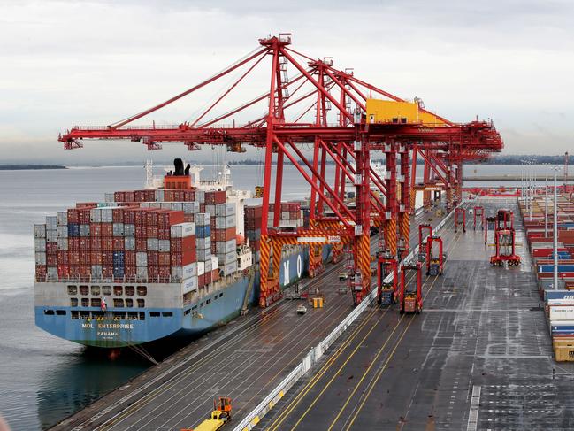 Some of the 45 driverless straddle carriers, used to pick shipping containers at Patrick Port Botany Container terminal.The machines guided by radar are part of a $600 million dollar upgrade of their facility.