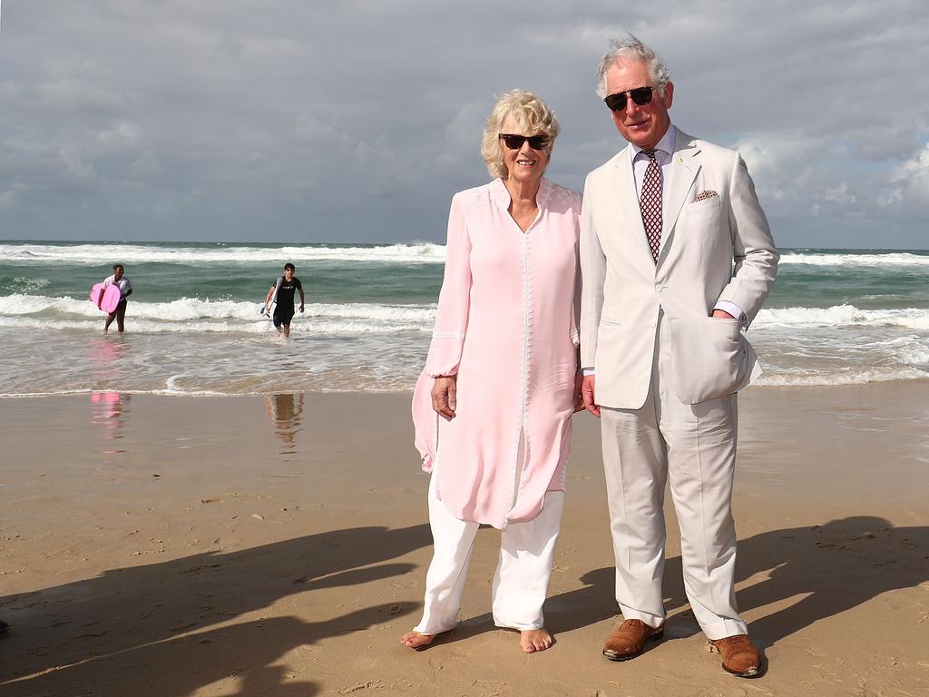 2018: Camilla kicked off her shoes as she walked along Broadbeach on the Gold Coast, while Prince Charles opted to keep his shoes on. Picture: Mark Metcalfe/Getty Images