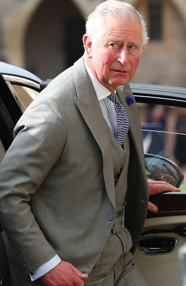 Britain's Prince Charles, Prince of Wales arrive to attend the wedding of Britain's Princess Eugenie of York to Jack Brooksbank at St George's Chapel, Windsor Castle, in Windsor, on October 12, 2018. (Photo by Gareth Fuller / POOL / AFP)