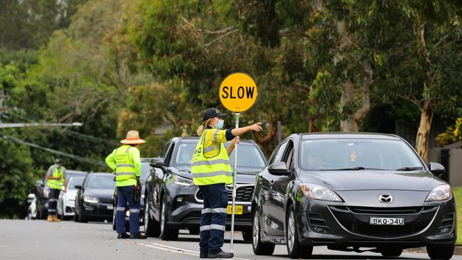 People queued in their cars for hours with some cars being turned away due to high volumes of traffic and long wait times at the Willoughby drive through testing site in Sydney. Picture: NCA Newswire / Gaye Gerard