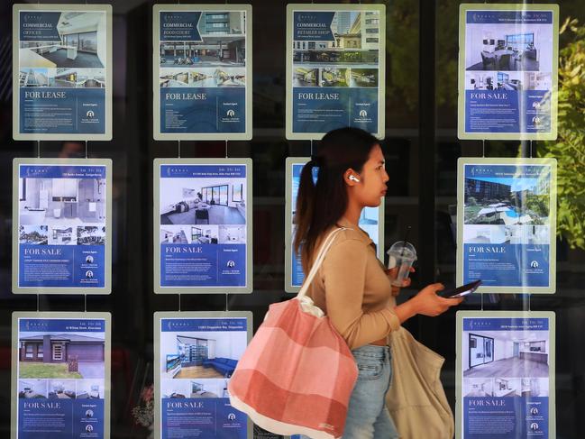 SYDNEY, AUSTRALIA - NOVEMBER 15: A pedestrian walks past a real estate agency in the central business district (CBD) on November 15, 2023 in Sydney, Australia. The Reserve Bank of Australia raised its key benchmark rate last week as inflation continues to hobble a strong economic recovery. The higher rates, in addition to low housing stock, had led many into a situation of housing stress in both the rental and owner-occupier markets. (Photo by Lisa Maree Williams/Getty Images)