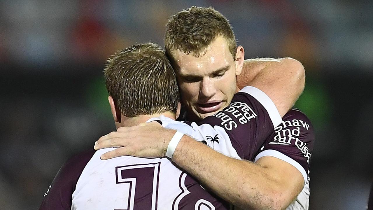 Jake Trbojevic and Tom Trbojevic of the Sea Eagles share a hug.