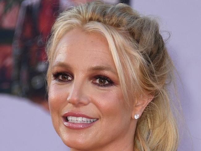 (FILES) In this file photo taken on July 22, 2019 US singer Britney Spears arrives for the premiere of Sony Pictures' "Once Upon a Time... in Hollywood" at the TCL Chinese Theatre in Hollywood, California. - op princess Britney Spears on September 12, 2021 announced her engagement to her boyfriend Sam Asghari via social media. (Photo by VALERIE MACON / AFP)