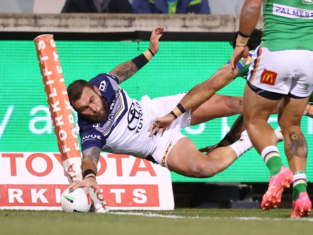 Kyle Feldt scores a freakish try. Picture: Mark Nolan/Getty Images