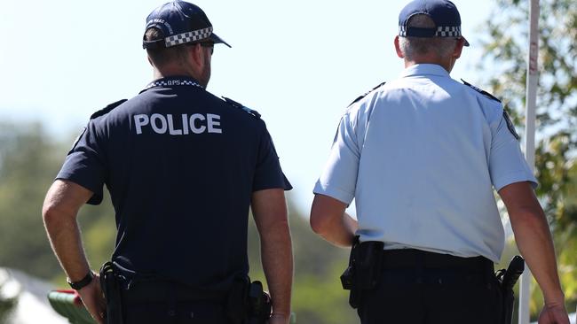 Police forensic officers at a DV scene on the Coast. Photo: Regi Varghese