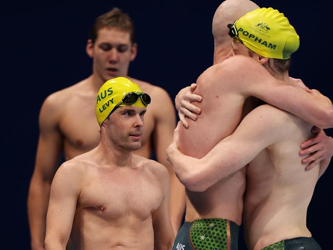 Matthew Levy, Rowan Crothers and Ben Popham celebrate after winning gold in the relay. Picture: Getty Images