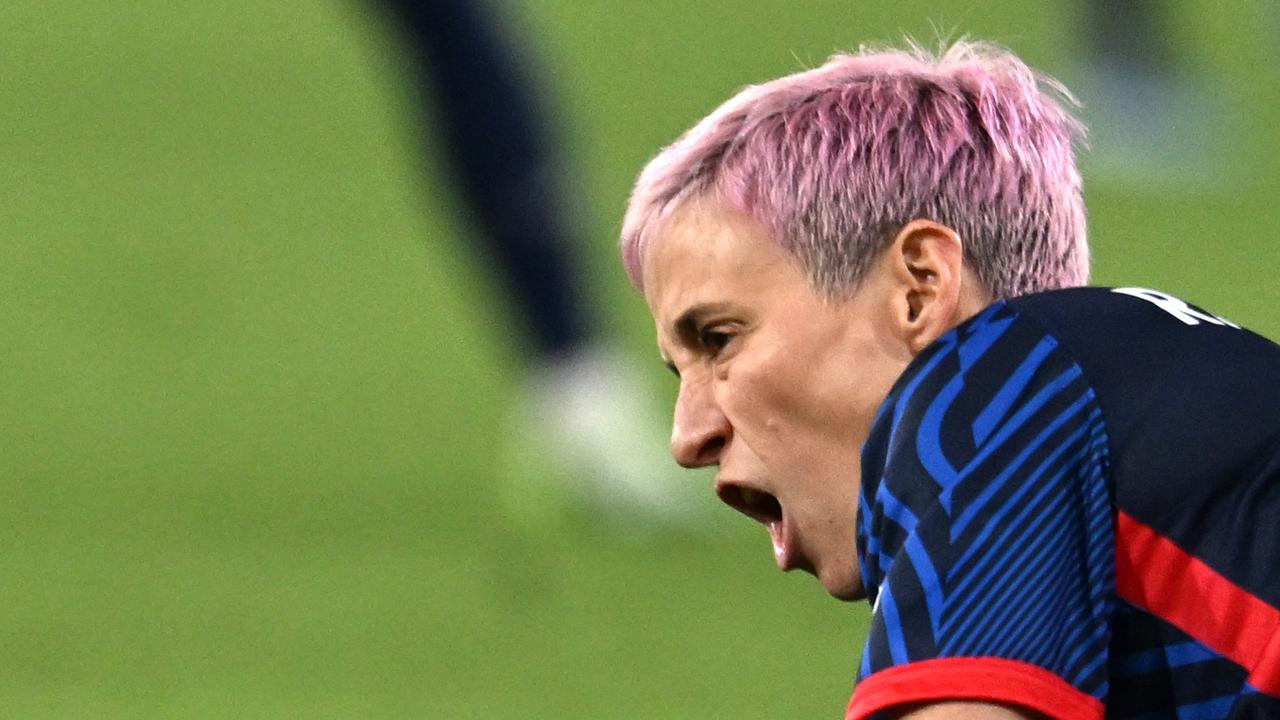 OL Reign's US midfielder #15 Megan Rapinoe reacts on the pitch after an injury in the early minutes of the first half of the National Women's Soccer League final match between OL Reign and Gotham FC at Snapdragon Stadium in San Diego, California, on November 11, 2023. This is Rapinoe's last professional game of her career as she retires from professional soccer. (Photo by Robyn Beck / AFP)