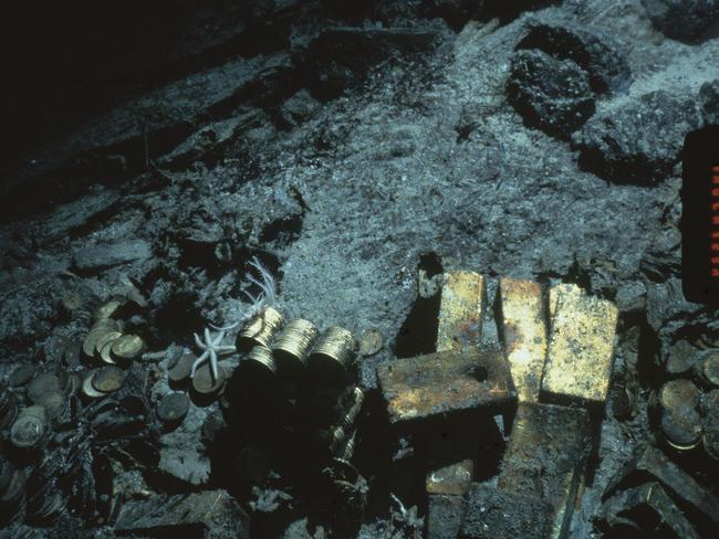 Gleaming find ... This 1989 file photo shows gold bars and coins from the S.S. Central America, a mail steamship, which sunk in a hurricane in 1857. Source: AP