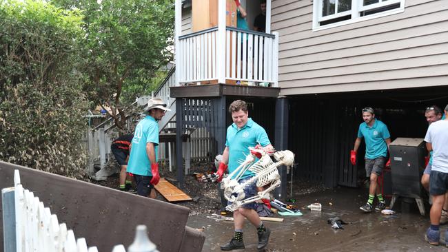Cleaning up in Vincent St, Auchenflower. Picture: Annette Dew