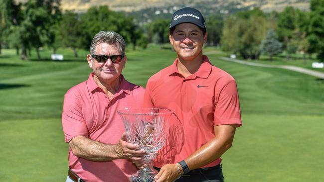 FARMINGTON, UTAH - AUGUST 04: Karl Vilips of Australia poses for photos with his father Paul after winning the final round of the Utah Championship presented by Zions Bank and Intermountain Health at Oakridge Country Club on August 04, 2024 in Farmington, Utah. (Photo by Alex Goodlett/Getty Images)