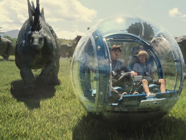 Terrifying ... Nick Robinson, left, as Zach, and Ty Simpkins as Gray, in a scene from Jurassic World. Picture: ILM/Universal Pictures/Amblin Entertainment via AP