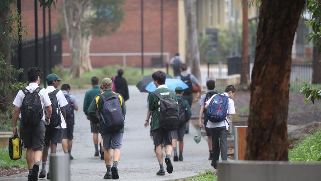 Students return to Epping Boys’ High School after it closed last Friday. Picture Rohan Kelly