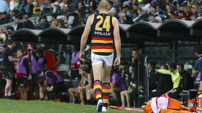 Adelaide ruckman Sam Jacobs walks to the bench after hurting his back in Showdown 44. Picture: Sarah Reed.