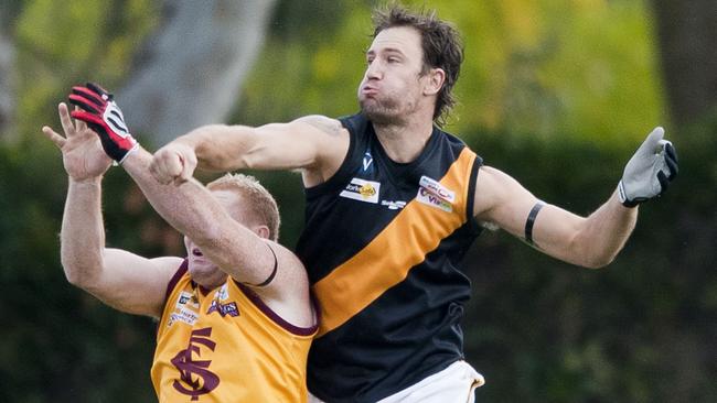 Guy Campbell (right) enjoyed a stunning country footy career.