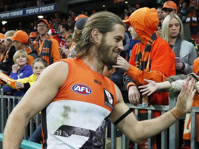 Giants Callan Ward with fans after their win over the Sydney Swans at Spotless Stadium. Picture. Phil Hillyard