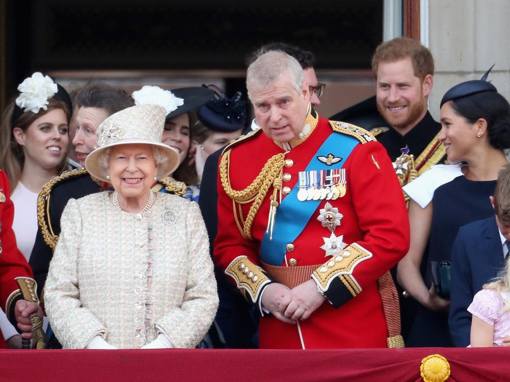 Meghan and Harry were all smiles, but their fans wondered why they weren’t more up front. Picture: Getty