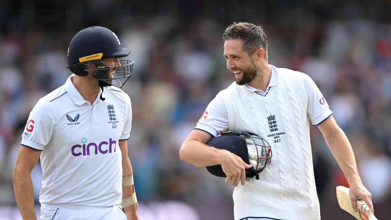 Chris Woakes (right) celebrates with teammate Mark Wood after hitting the winning runs. Picture: Stu Forster/Getty Images