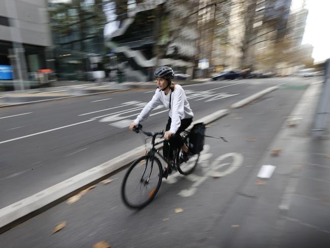 The protected bike lanes along Exhibition St feature adjustable kerb materials. Picture: Alex Coppel