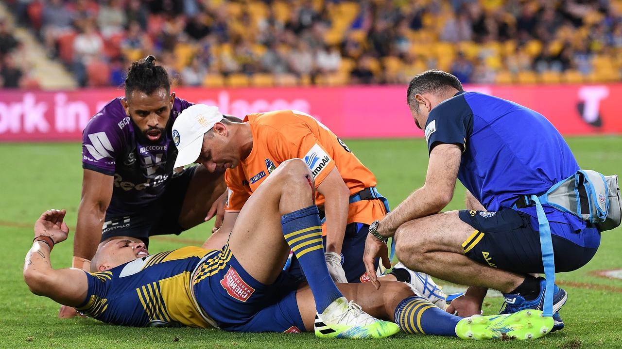 Josh Addo-Carr comforts Blake Ferguson after he suffers a nasty injury. (Photo by Bradley Kanaris/Getty Images)